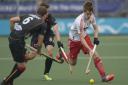 Onwards and upwards: Henry Weir in action during England's 3-2 win over Belgium at the Hockey World Cup in The Hague
