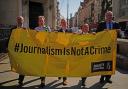 Supporters of journalists Barry McCaffrey and Trevor Birney, outside the Royal Courts of Justice in London, before their Investigatory Powers Tribunal (PA)