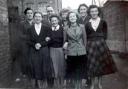 Bessie Anderson is in the front row, second from the left.