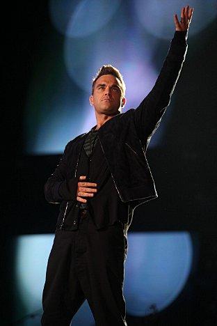 Take That star Robbie Williams dedicated a version of his hit Angels to British troops