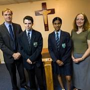 Welcome: Headteacher Paul Enright, Tom Devlin, 14, Jewel Fernandes, 14, and chaplain Roseleen Fox