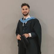 Reporter Berk Uyal graduating after four years at Bournemouth University (NS)