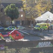 An ambulance lands on Queen's Road after the stabbing Photo by @samo_ak47 on Twitter.