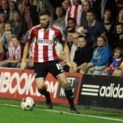 Brentford: Dallas snatches win for Bees