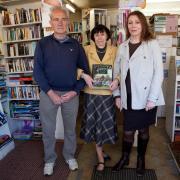 Happier times ahead: Ray Brown, Joy Mckie who has run the shop for 16 years and Actress Julie Bevan