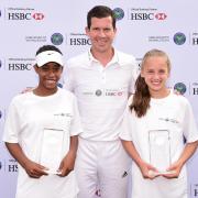 Winners: Tim Henman flanked by Leah Gonzales-Edwards, left, and her doubles partner Cheri Darley, right