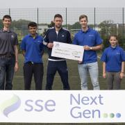 Worldly wise: Gary Cahill, centre, met Olivia Weedon, far right at the Surrey Sports Park in Guildford last week
