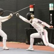 In action: Georgina Usher, right, with the epee in hand