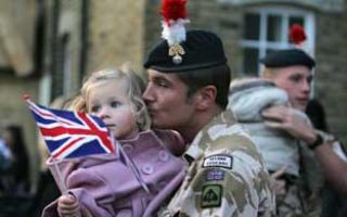 Homecoming: Fusilier Steve McCowliff is reunited with two-year-old daughter Lexie