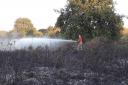Eight fire engines and around 60 firefighters were called to a grass fire at Hounslow Heath, a park off of Staines Road / Image: London Fire Brigade