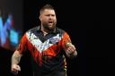 Michael Smith booked his place in Premier League play-offs at the O2 Arena next week (Martin Rickett/PA)