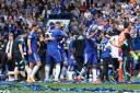 Happy days: Chelsea players celebrate victory over Crystal Palace, and the small matter of the Premier League title