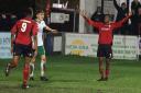 King pin: Hampton's Jamal Lowe, right, laps up the applause for his second goal against Bognor Regis Town on Tuesday night