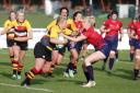 On the charge: Former England Women international Amy Turner carries the ball up for Richmond Ladies