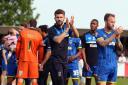 Community connection: AFC Wimbledon take in a lap of honour after the Newport win, now for the play-offs