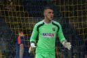 Man in demand: Goalkeeper Mark Smith was released from Brentford this week and could switch to Hampton