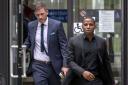 Footballer Ben Chorley who was fined £1,000 for taking a photograph and a short clip during the hearing (left) with Jason Puncheon who was sentenced for a public order offence leaving Staines Magistrates' Court. Photo: Steve Parsons/PA Wire