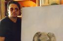 From tusk till dawn: Satvinder Gill with one of his paintings