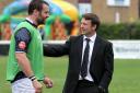 Business like: Simon Amor, right, on the sidelines during his spell as director of rugby at London Scottish