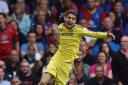 Goal man: Oscar celebrates his goal in Chelsea's 2-1 win over Crystal Palace in October - more of the same and Chelsea can strut their stuff against Liverpool as Premier League champions