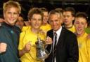 Star quality: Nick Jupp (left) and his team-mates accept the trophy from former England striker Gary Lineker after their penalty shoot-out win.
