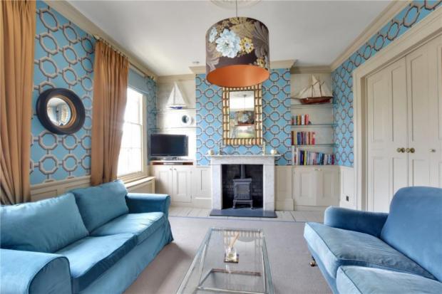 Richmond and Twickenham Times: The living room features shades of blue. (Rightmove)