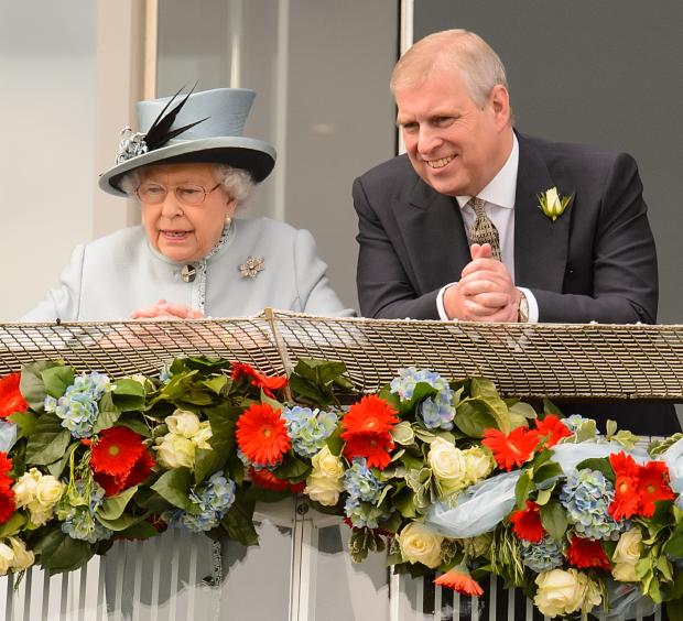 Richmond and Twickenham Times: (left to right) Queen Elizabeth II and Prince Andrew. Credit: PA