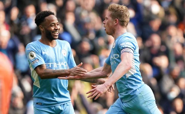 Richmond and Twickenham Times: Manchester City's Kevin De Bruyne (right) celebrates with Raheem Sterling after scoring their side's first goal of the game during the Premier League match at Etihad Stadium, Manchester.