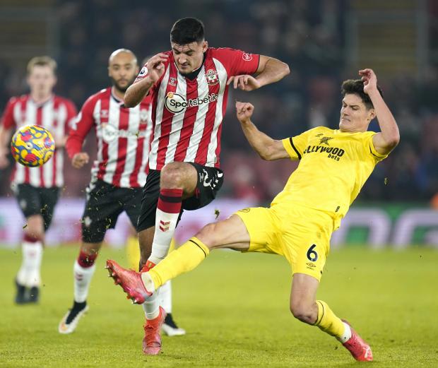 Richmond and Twickenham Times: Brentford's Christian Norgaard (right) and Southampton's Armando Broja battle for the ball during the Premier League match at St Mary's Stadium, Southampton.