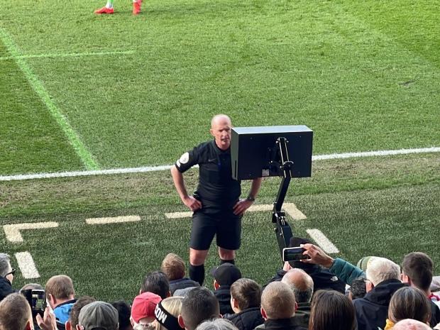 Richmond and Twickenham Times: Referee Mike Dean consulted the VAR monitor before sending off Brentford midfielder Josh Dasilva