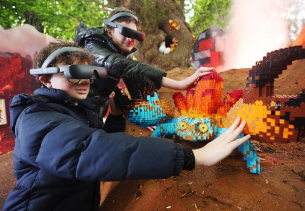 Richmond and Twickenham Times: Lucca and Sonny using the eSight eyewear as they explored the Magical Forest (LEGOLAND Windsor)