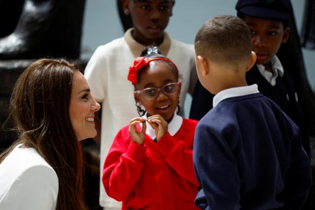 Richmond and Twickenham Times: The Duchess of Cambridge speaks with children at the unveiling of the National Windrush Monument the unveiling of the National Windrush Monument at Waterloo Station, to mark Windrush Day