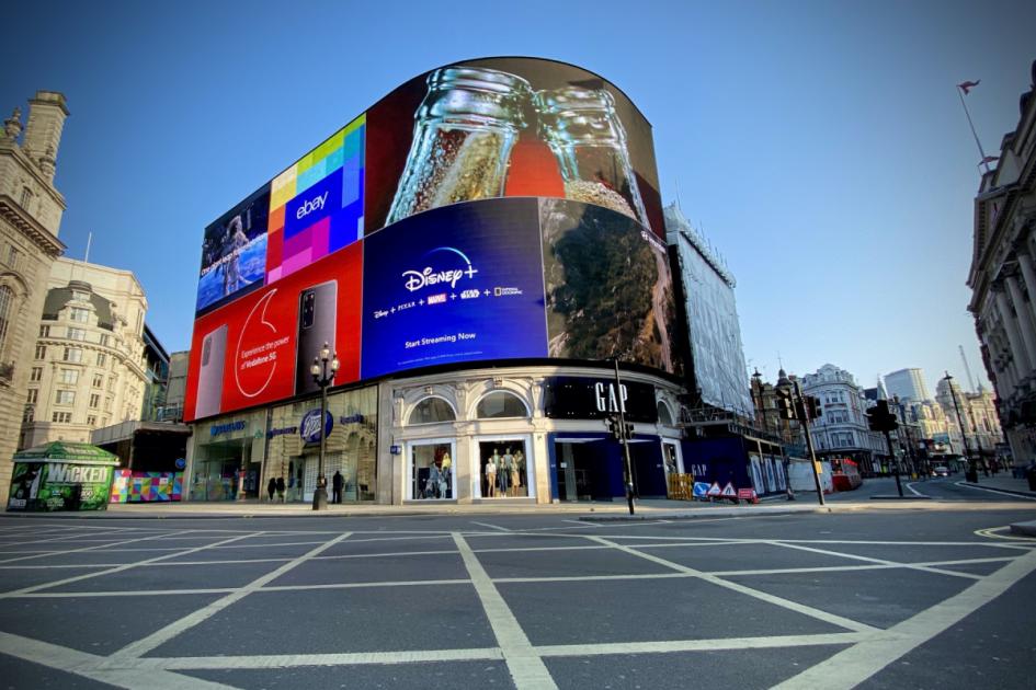 What is Piccadilly Circus famous for and how it got its name
