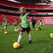 Children played at Wembley in a free football session.