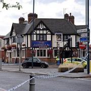 Mystery death: Police were today investigating the death of a man found slumped in a car outside a pub. Pic: Darren Graham