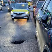 Police were first called to the sinkhole yesterday (January 4) at around 4pm on Kingston Road, near the junction with Holmesdale Road