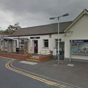 Emergency services are at Ashford station after the woman was hit by a train (pic: Google Maps)