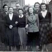 Bessie Anderson is in the front row, second from the left.