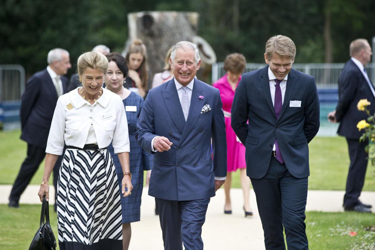 Prince Charles takes a stroll with the Duchess of Wellington and artistic director Christopher Powney
